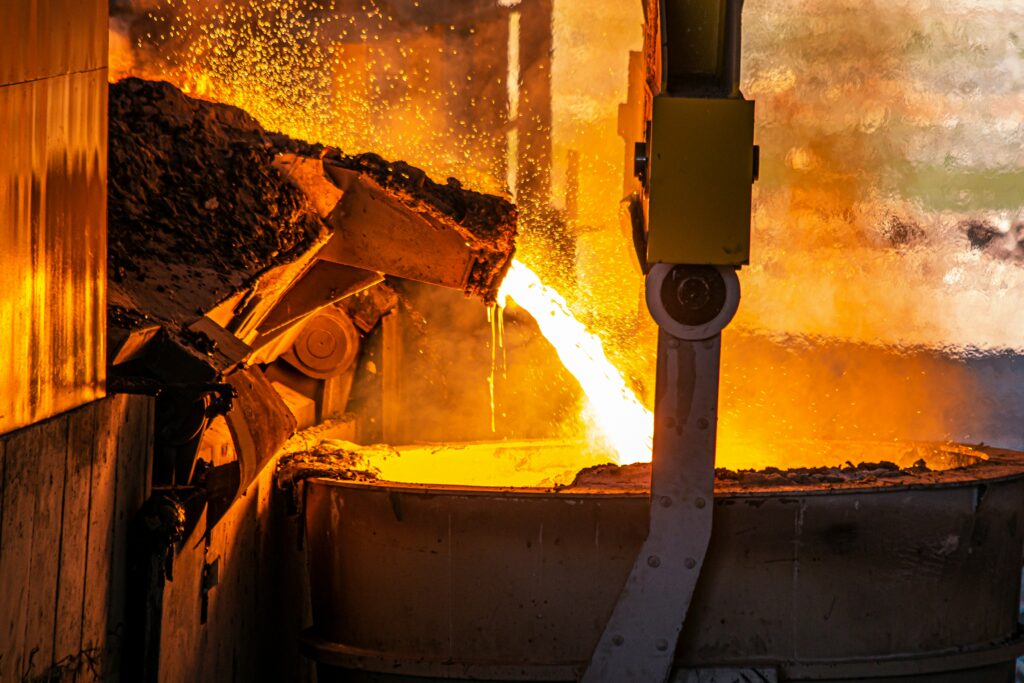 Molten metal being poured in a steel plant — captured by Yasin Hemmati in Jolfa, Iran. Photo via Unsplash