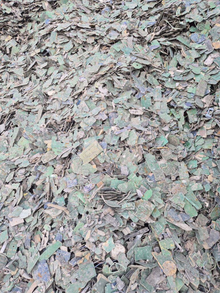 A heap of shredded circuit boards