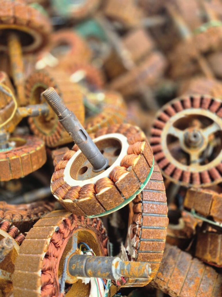 Close-up of a motor stator with its copper windings, among other motor cores