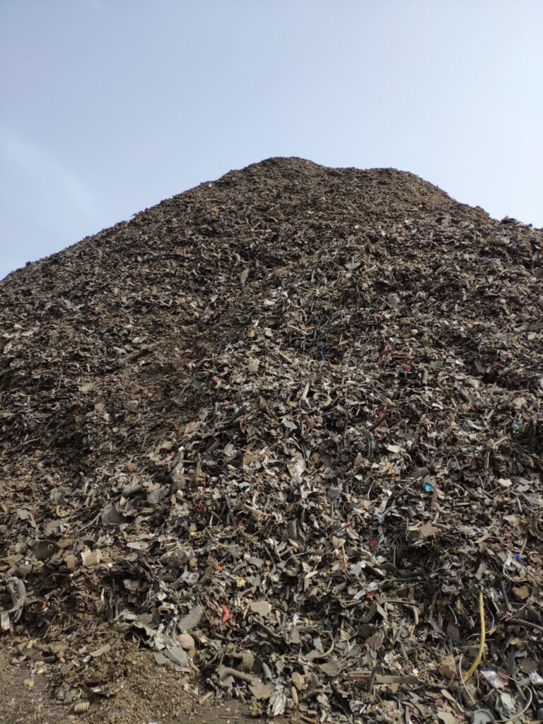A heap of shredded ferrous scrap